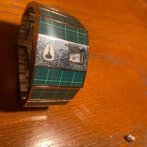 Rare Nixon plaid rotolog. Stylish Yellow green and red Watch